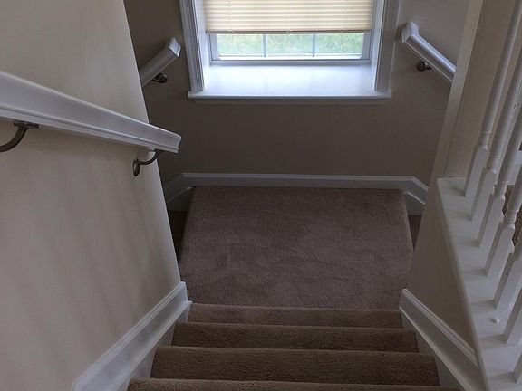 Split stairs to lower level and front door