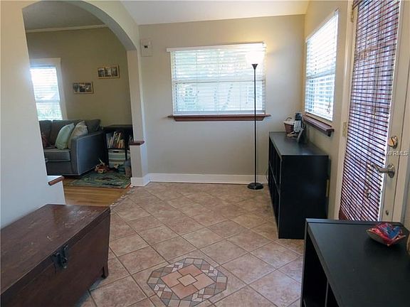 Front Sun room with tile floors