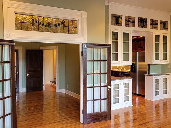 Living Room Facing Dining Room and Kitchen