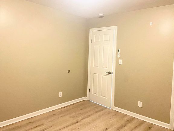 Bright and spacious bedroom with ample natural light, a generous closet for plenty of storage space for clothing and personal items, and its own mini-split system for personalized heating and cooling, ensuring comfort in every season.