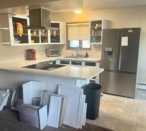 Cabinets are being finished this week, will be done before rental