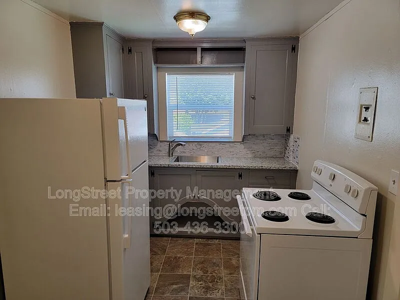205 NW Kings Blvd #11