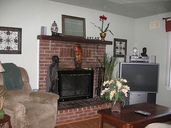 Den with Brick Fireplace