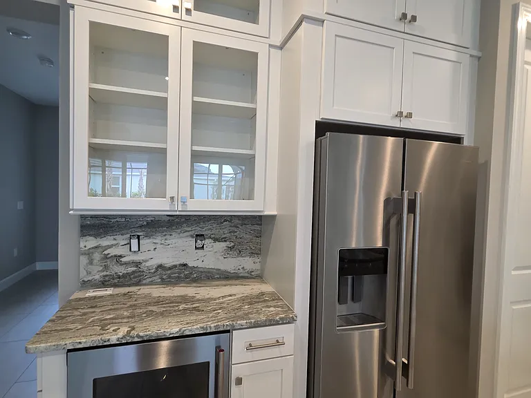 Wine fridge, coffee bar, cookbook area