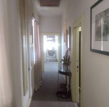 Looking down hallway to apartments