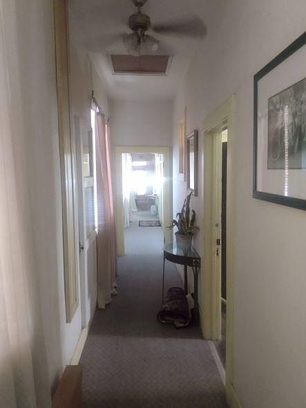 Looking down hallway to apartments