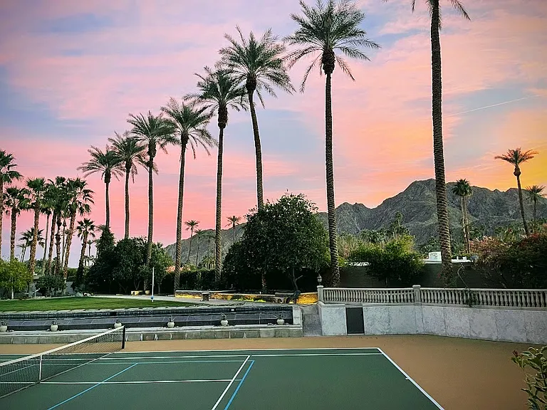 Your own private Tenniscourt , solid tall wall compound. Stately palms lit at night, many citrus trees for fresh juice