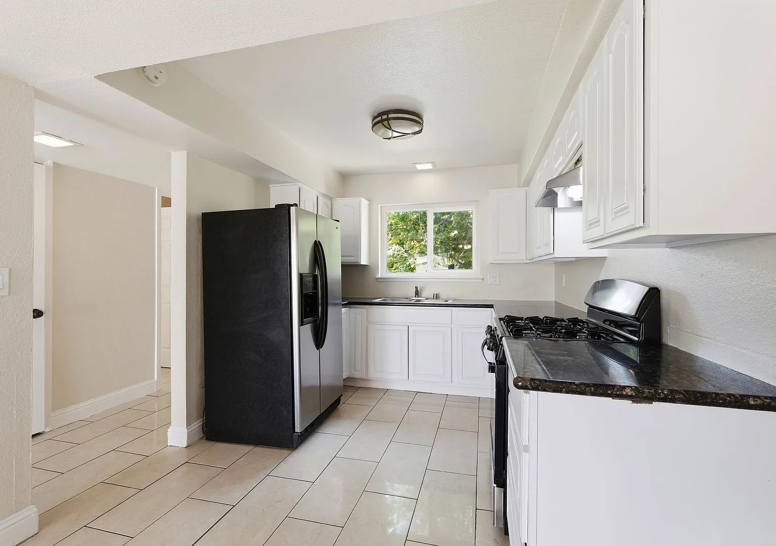 Fully Remodeled 3-Bedroom Townhome Two Car Garage - Available Now — Photo 3