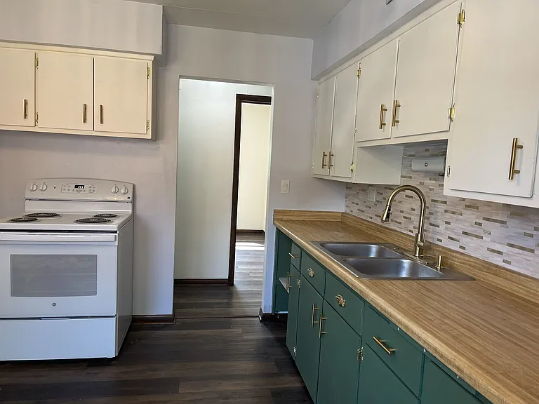 Kitchen with brushed gold accents.