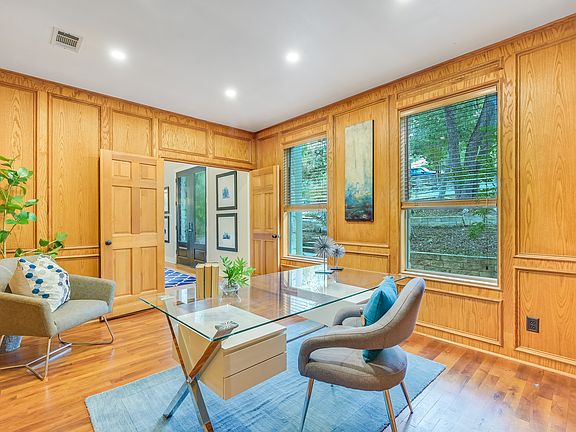 The richness of the home office is enhanced by wood detail throughout.