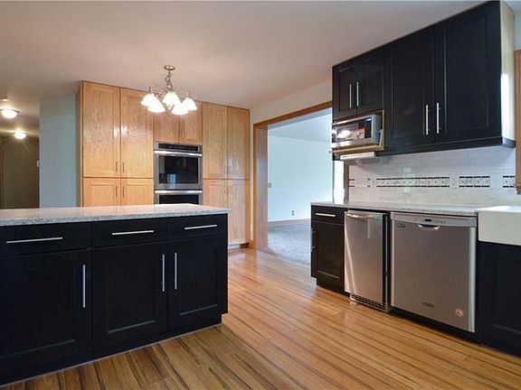 Kitchen has huge ceiling to floor pantry, duel ovens, new dish washer, sonic ice maker produces 85lbs of ice a day, microwave ov