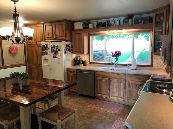 Kitchen looks out onto yard