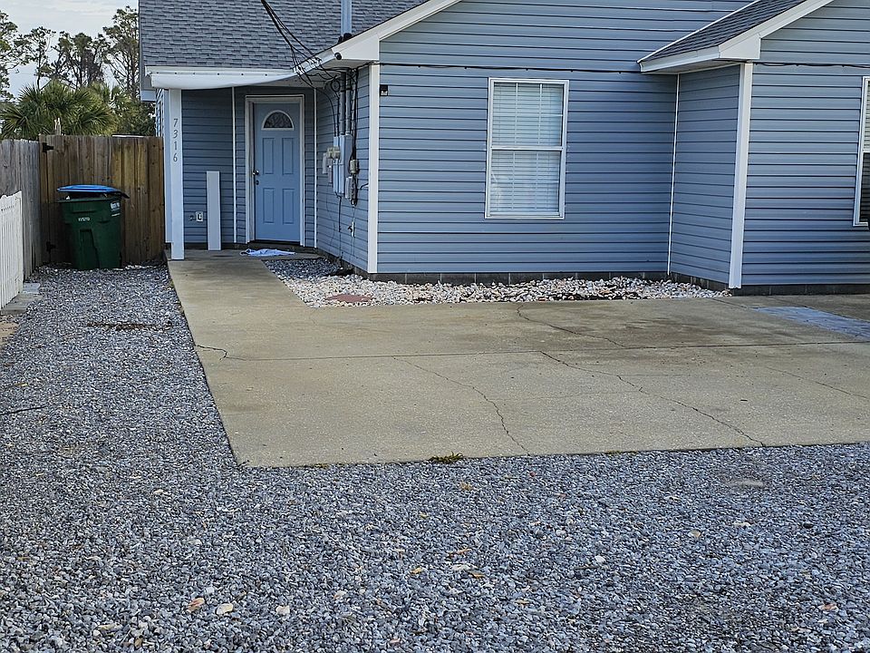 Left side of duplex is available. One block from Rick Seltzer Park/ Beach