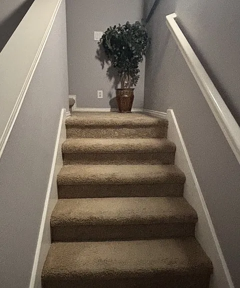 stairs leading upstairs to loft