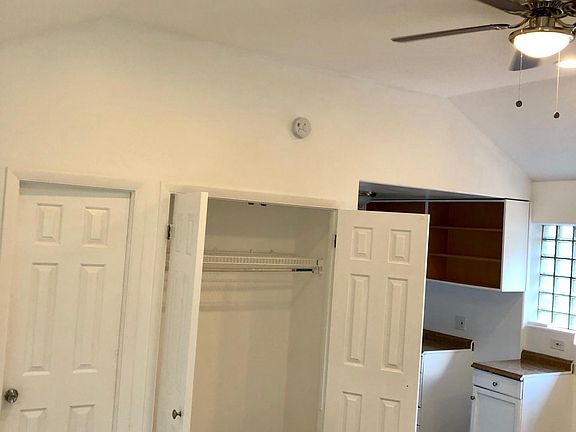 Looking into Main Closet and Kitchen