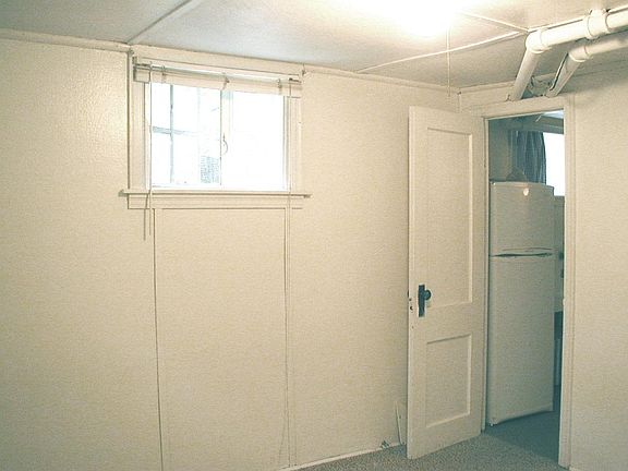 Looking from the bedroom to the kitchen area.