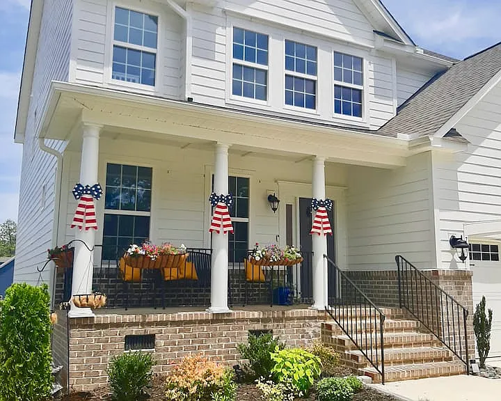 Exterior with 3 car garage.