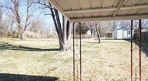 Fenced Backyard w/ Storage