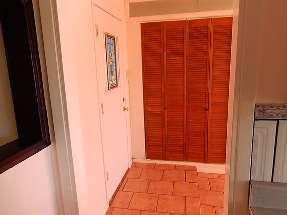 den entrance, washroom doors