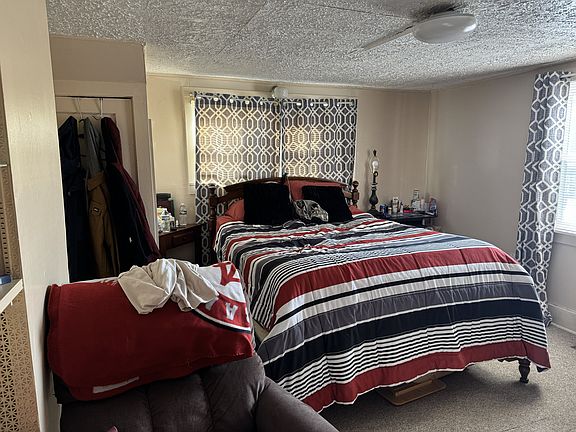 Living room, currently being used as a bedroom.