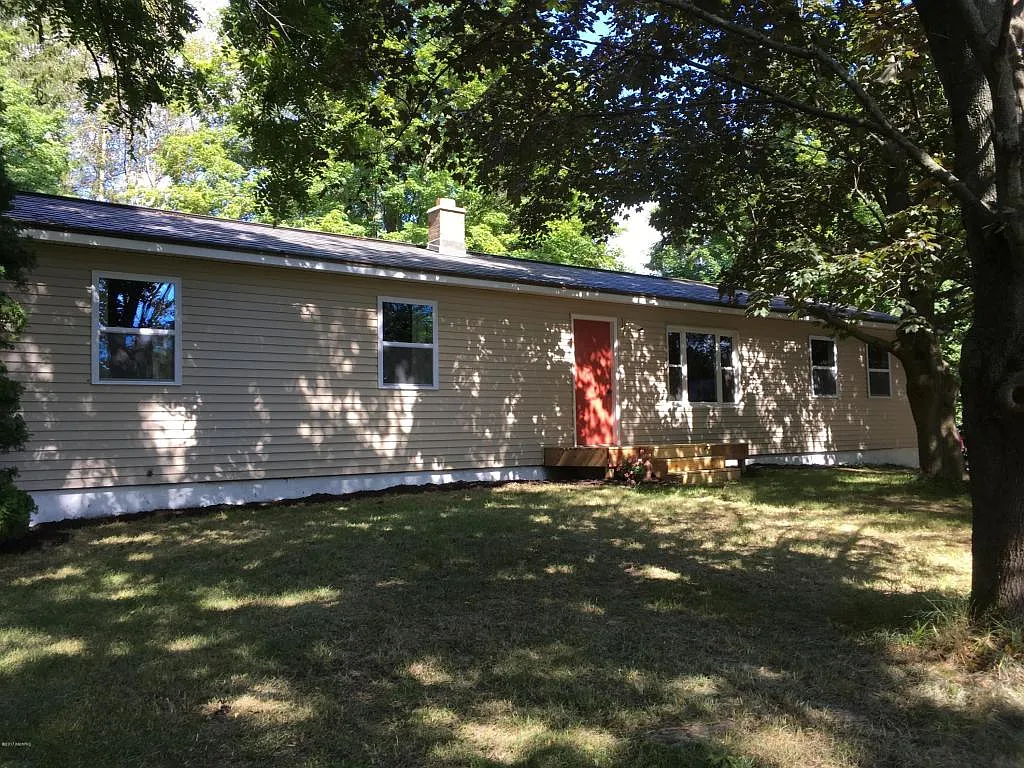 4684 Whitneyville Ave SE photo 1
