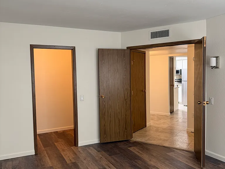 Master bedroom with double doors.
