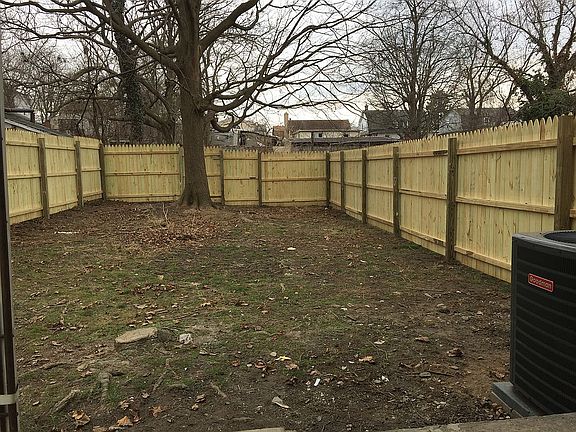 Large fenced and shaded yard