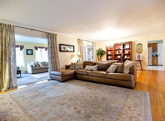 Living Room with View of Sunroom