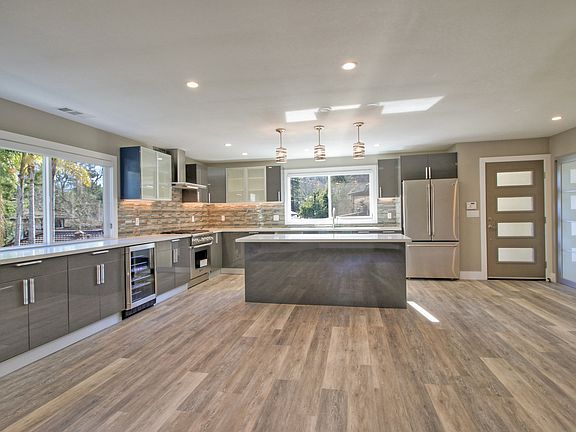 Step inside to the Open Concept Kitchen and Dining Area