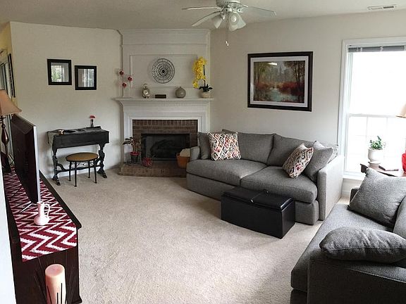 Carpeted Living Room with gas fireplace