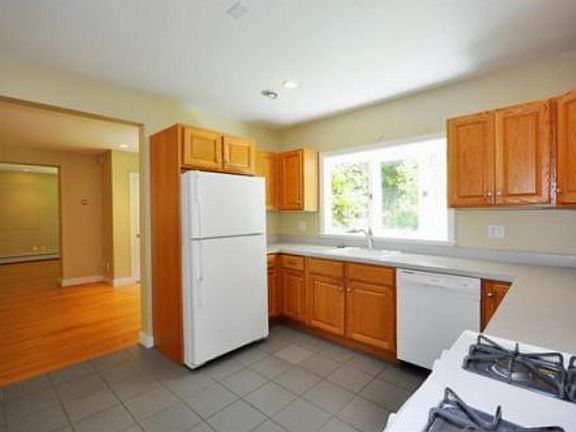 Kitchen with sunny eating area