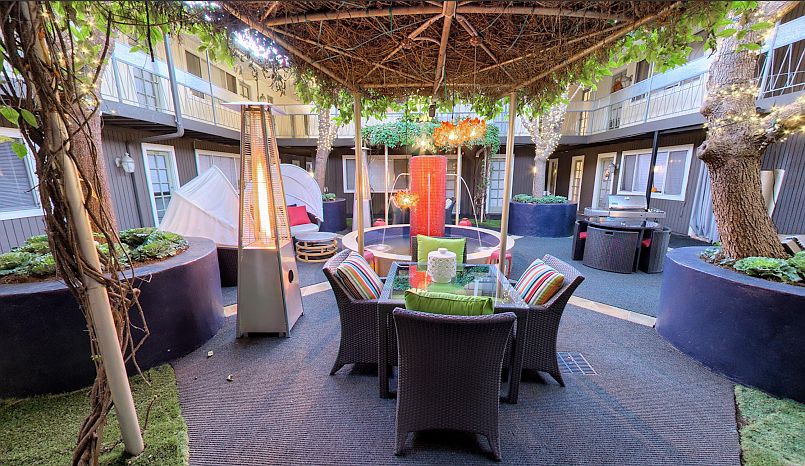 1001 Grigsby - RALEIGH CLAYTON Courtyard cabana seating