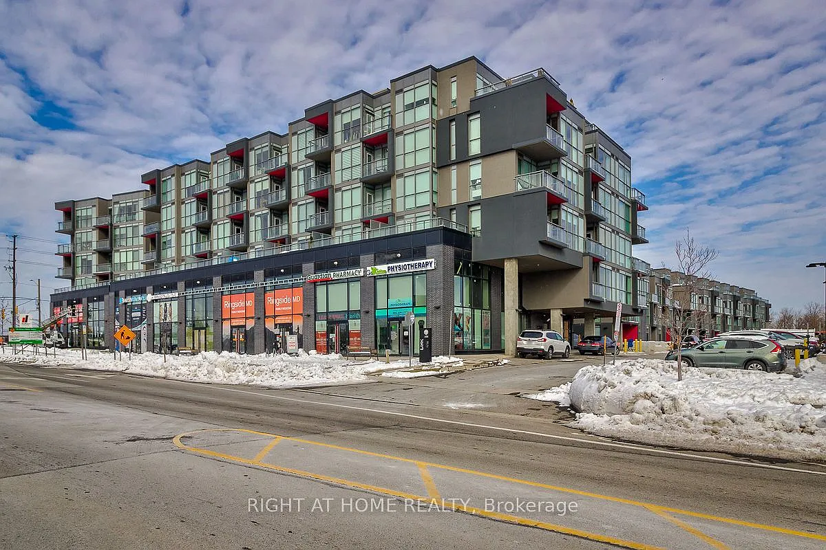 Building Photo - 5260 Dundas St #306