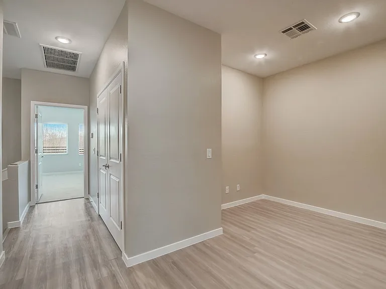 Layout has flex room and smaller laundry room