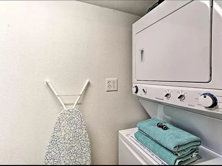 Enjoy the convenience of a washer and dryer, iron and ironing board, laundry detergent, and other essentials provided for a comfortable extended stay.