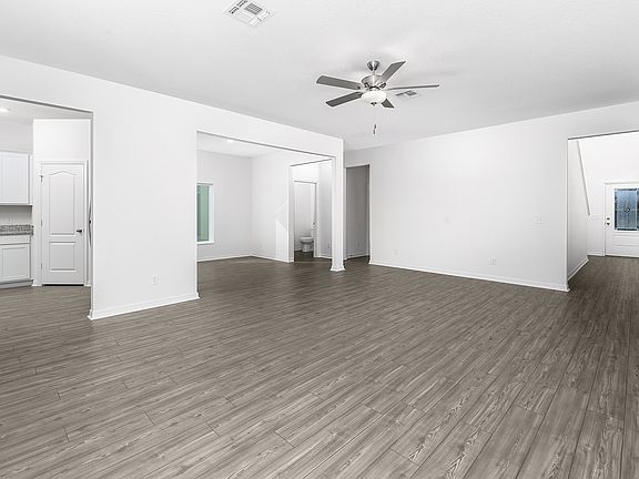 The foyer leads to a large dining room