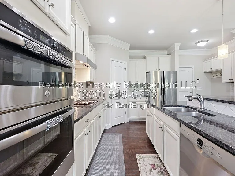 9659 Camberley Ave NW — Photo 14