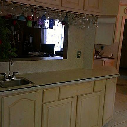 Bright Kitchen Cabinetry throughout