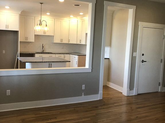 open concept kitchen/dining/living