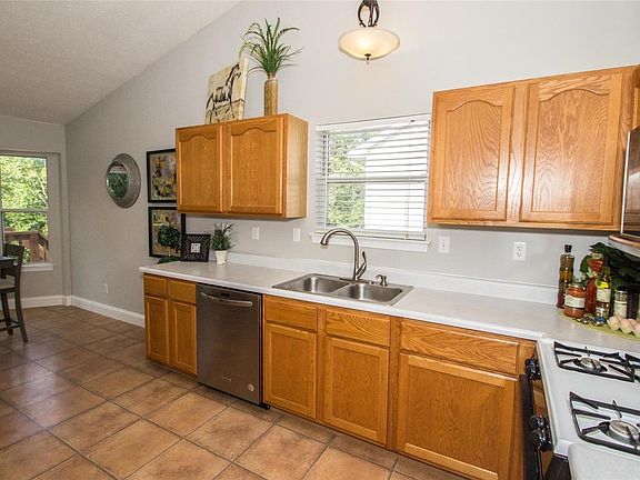 Vaulted kitchen with tons of storage space!