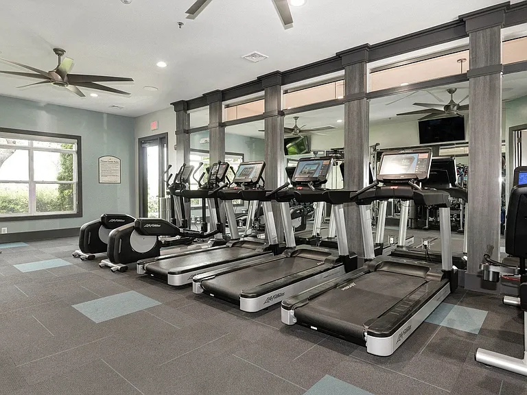 Our fitness center is complete with free weights and cardio machines.