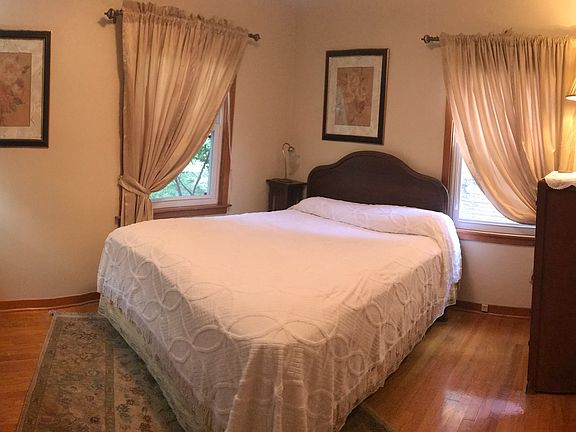 Bedrooms with hardwood floor