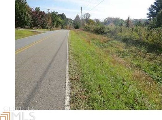 Over 250 feet of frontage plus over 950 feet deep! Could be small farm or neighborhood!