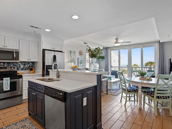 The main living space complete with amazing sunrise over the ocean views.