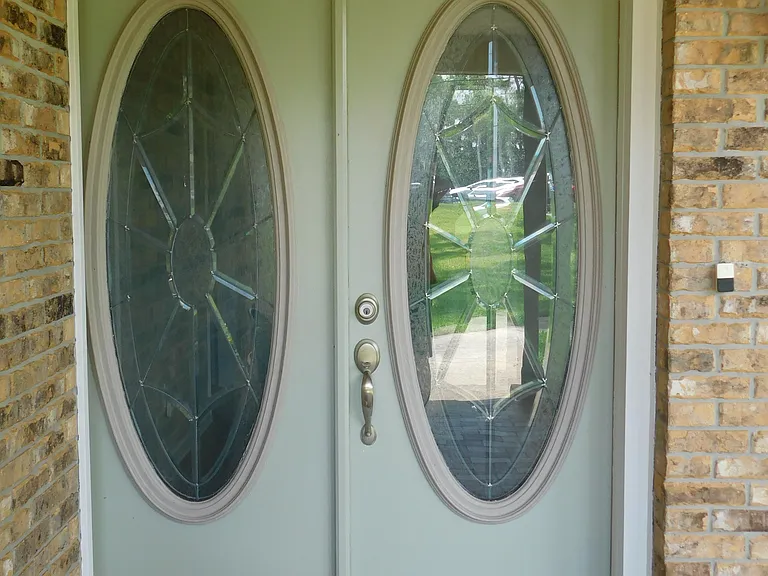 Beautiful bevelled glass double entry doors...let's go inside!