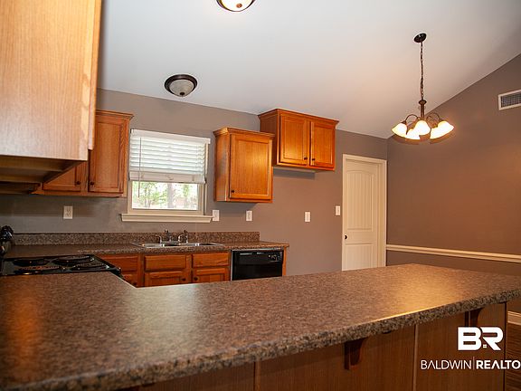 4th image of 9530 Fox Hunter Ct W