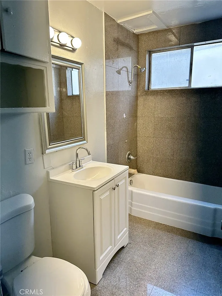 Building Photo - 4830 Canoga St #4830E