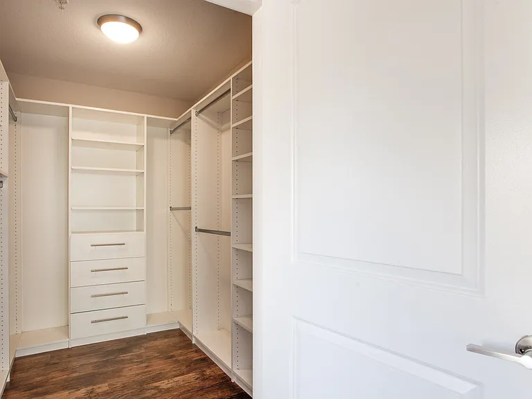 Store all your clothing and belongings in your walk-in closets