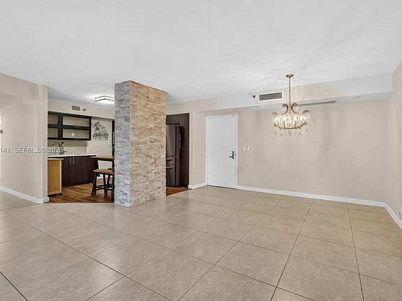 4th image of 3500 Mystic Pointe Dr APT 302