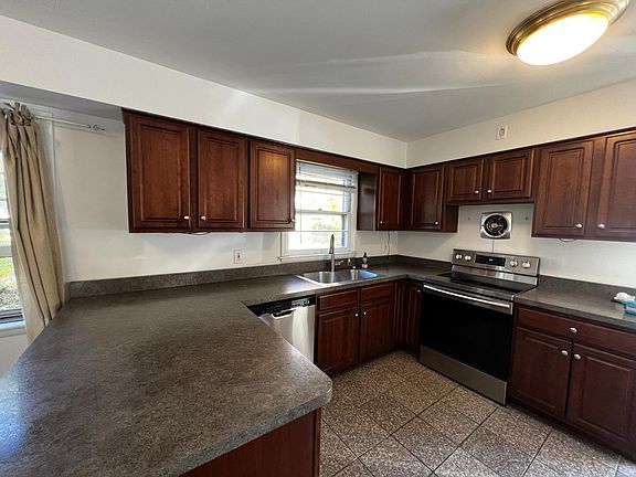 Large kitchen, lots of cabinet and counter space.